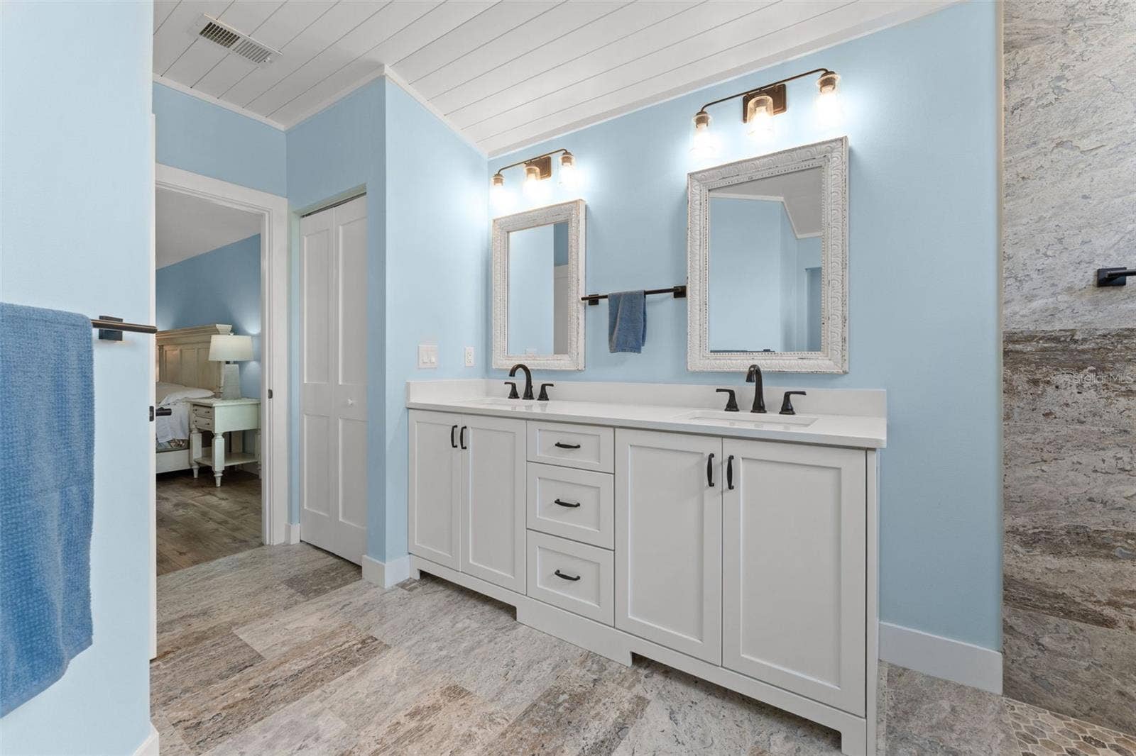 Note the beautiful custome shiplap ceiling