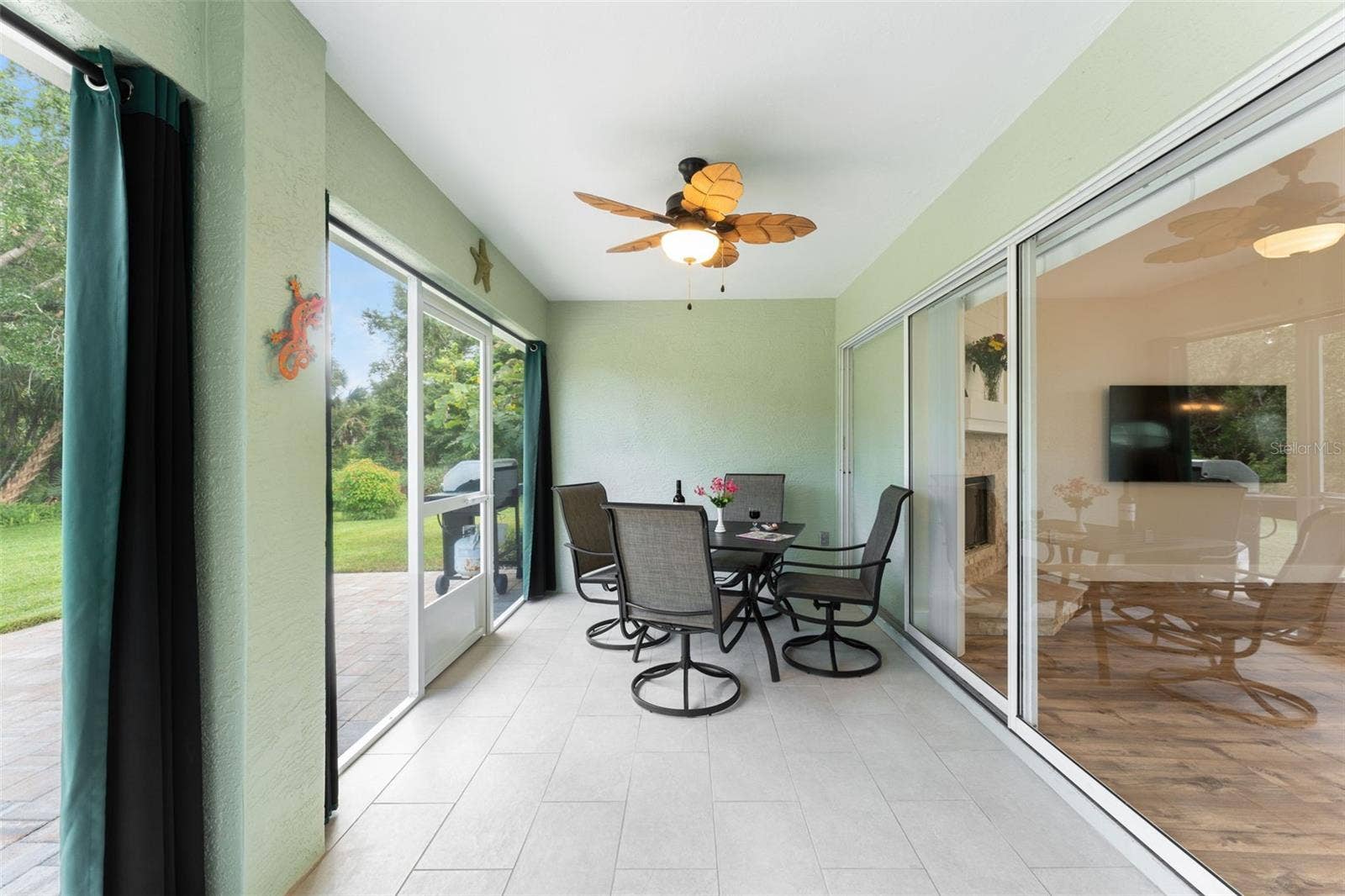 Screened in lanai with collapsing/stacking sliders.