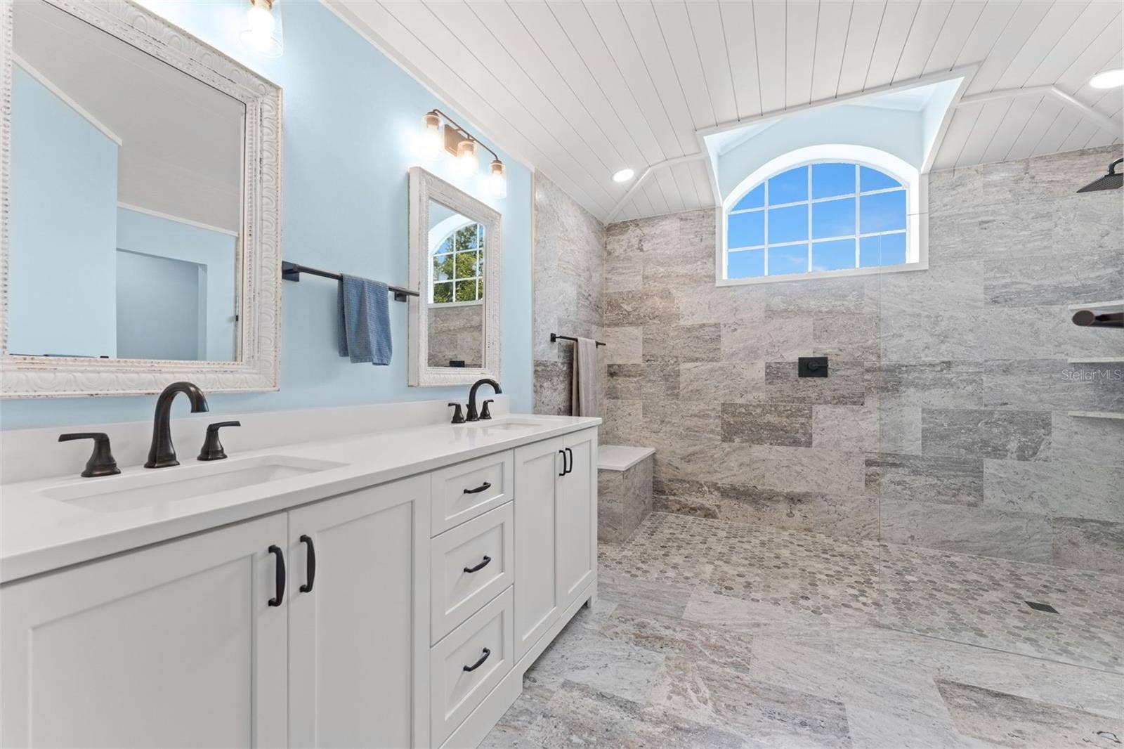 Primary bathroom with  "wet room" shower.