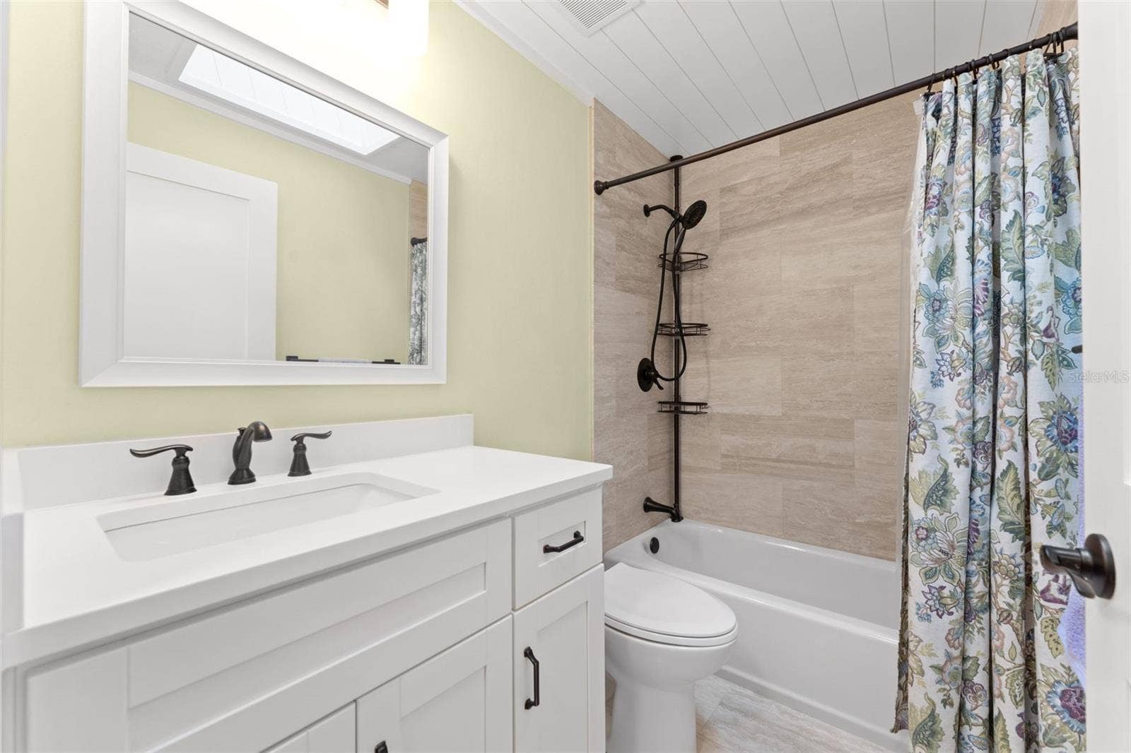 Guest Bathroom... Shiplap and Skylight ceiling details