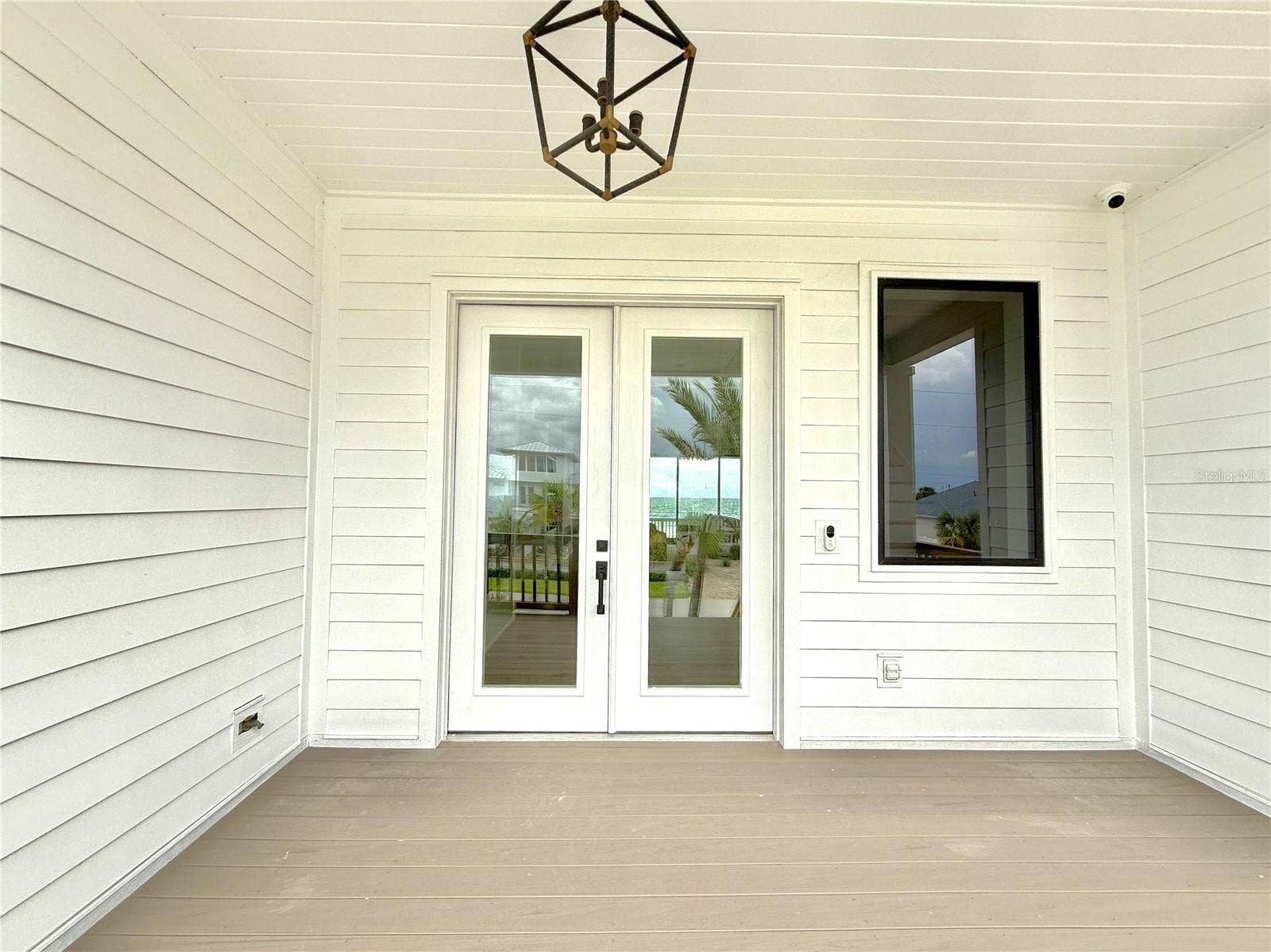 4643 VAN KLEECK DRIVE, New Smyrna Beach, FL 32169 2nd Floor Covered Entry Landing