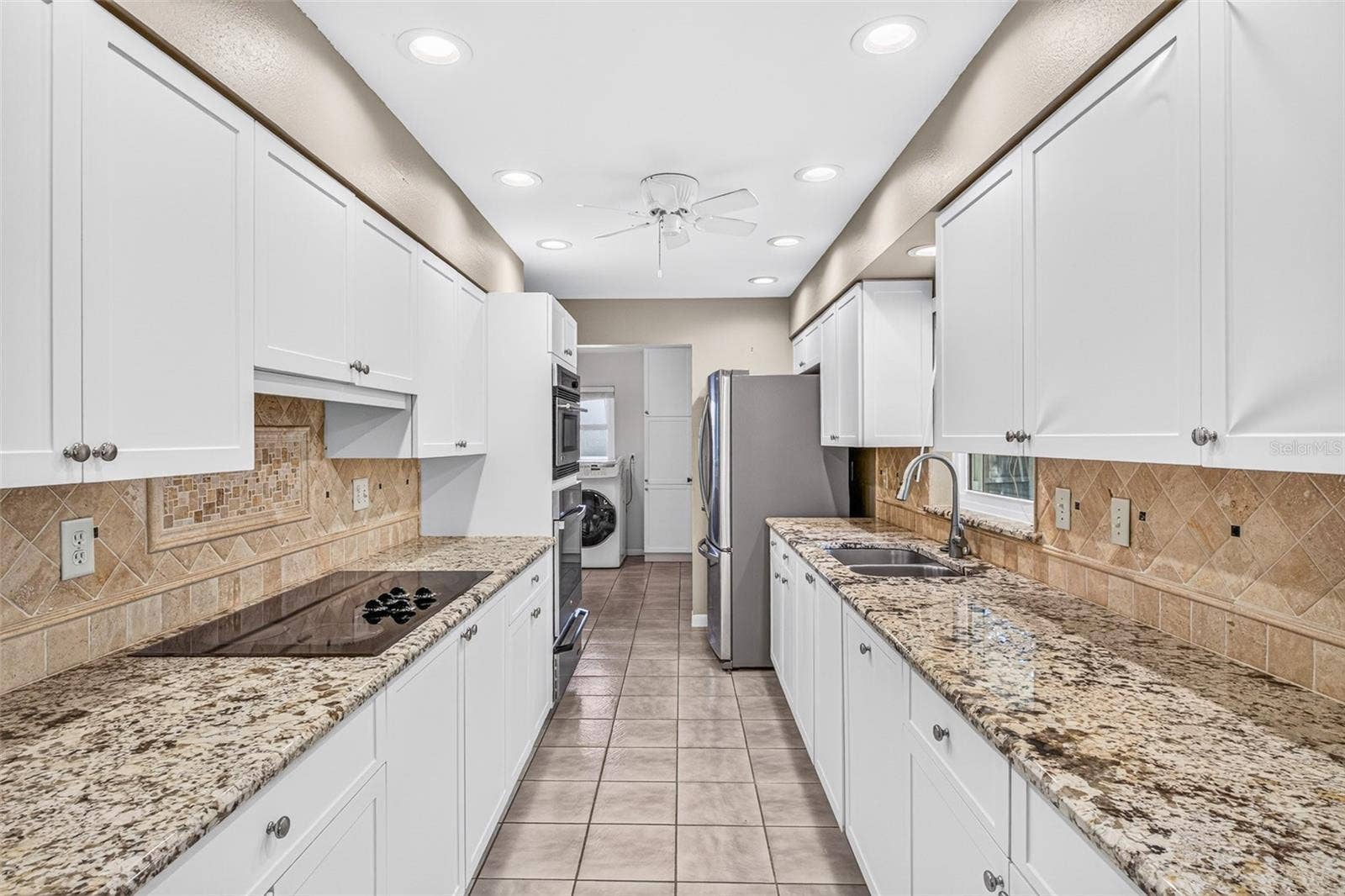 301 VALENCIA COURT, Winter Garden, FL 34787 Kitchen to laundry