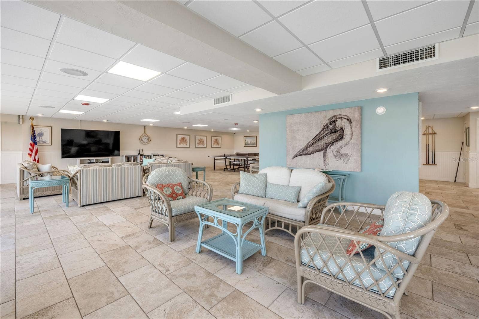 3606 S PENINSULA DRIVE, #205, Port Orange, FL 32127 Honor system lending library and large screen TV