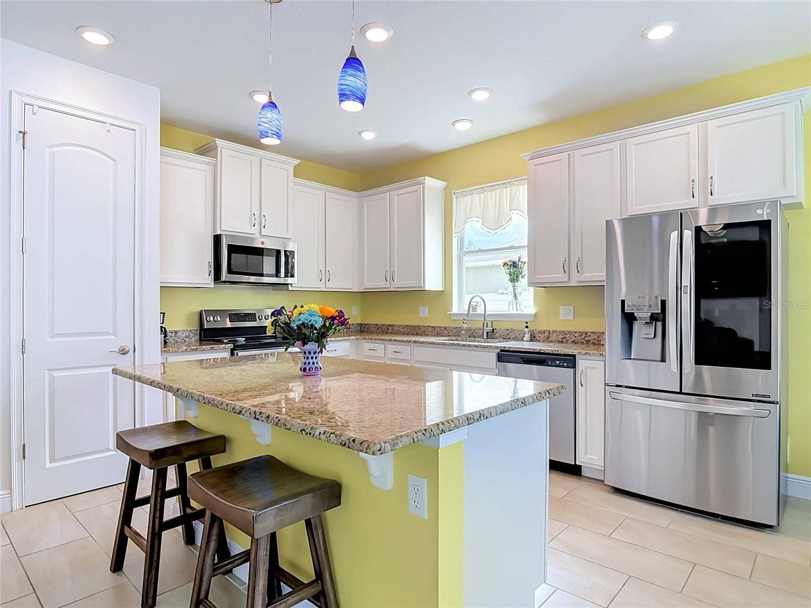 Kitchen island with electrical outlets on each side