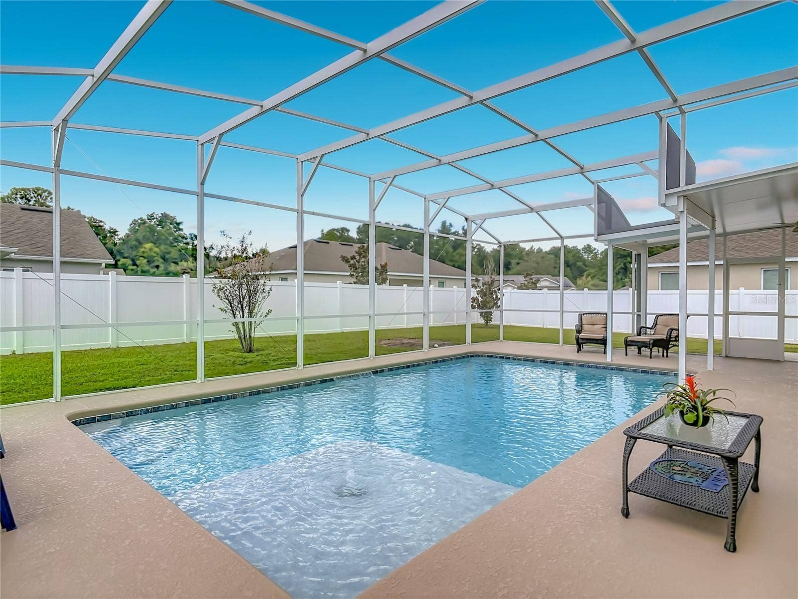 Entire backyard is fenced for privacy around pool
