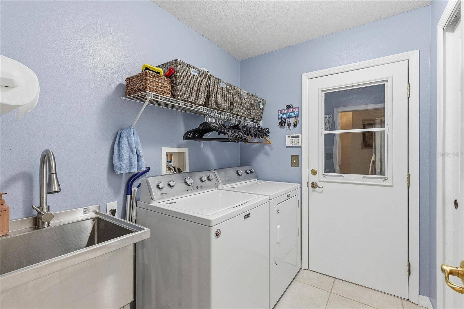 6209 MORNING DRIVE, Port Orange, FL 32127 Indoor Laundry Room w/Sink & Storage Closet
