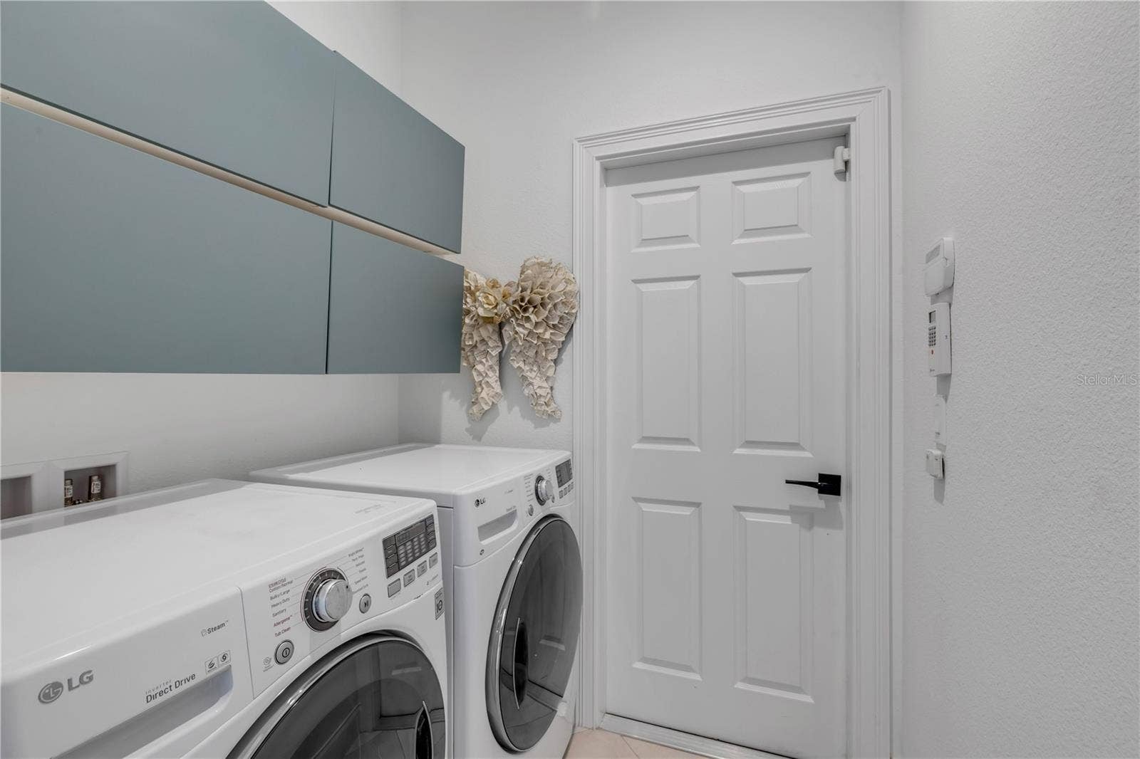 189 ASPEN WAY, Palm Coast, FL 32137 Laundry Room off garage and guest wing.