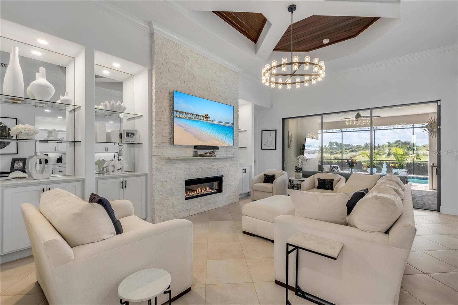 189 ASPEN WAY, Palm Coast, FL 32137 Gas fireplace with stacked stone surround.