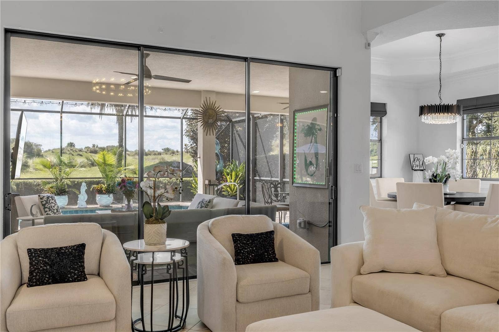 189 ASPEN WAY, Palm Coast, FL 32137 3 sliders invite the outdoors inside.