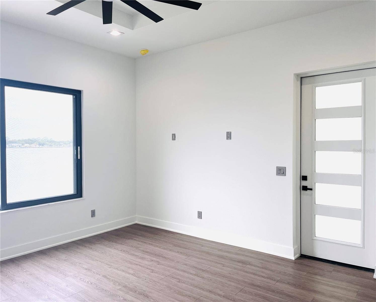 2115 N HALIFAX AVENUE, Daytona Beach, FL 32118 PRIMARY ENSUITE W/DOOR ACCESSING BALCONY