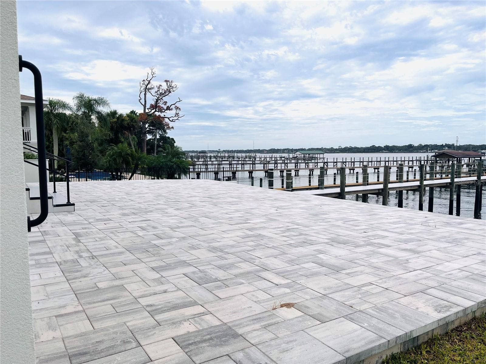 2115 N HALIFAX AVENUE, Daytona Beach, FL 32118 REAR PAVERED PATIO