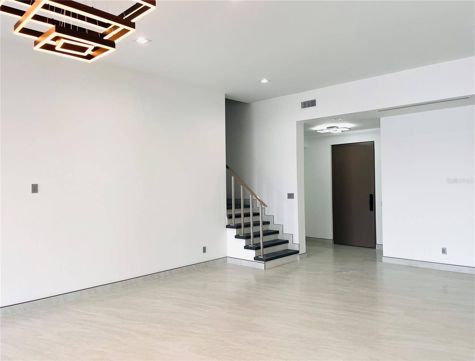 2115 N HALIFAX AVENUE, Daytona Beach, FL 32118 FOYER ENTRY AND GREAT ROOM