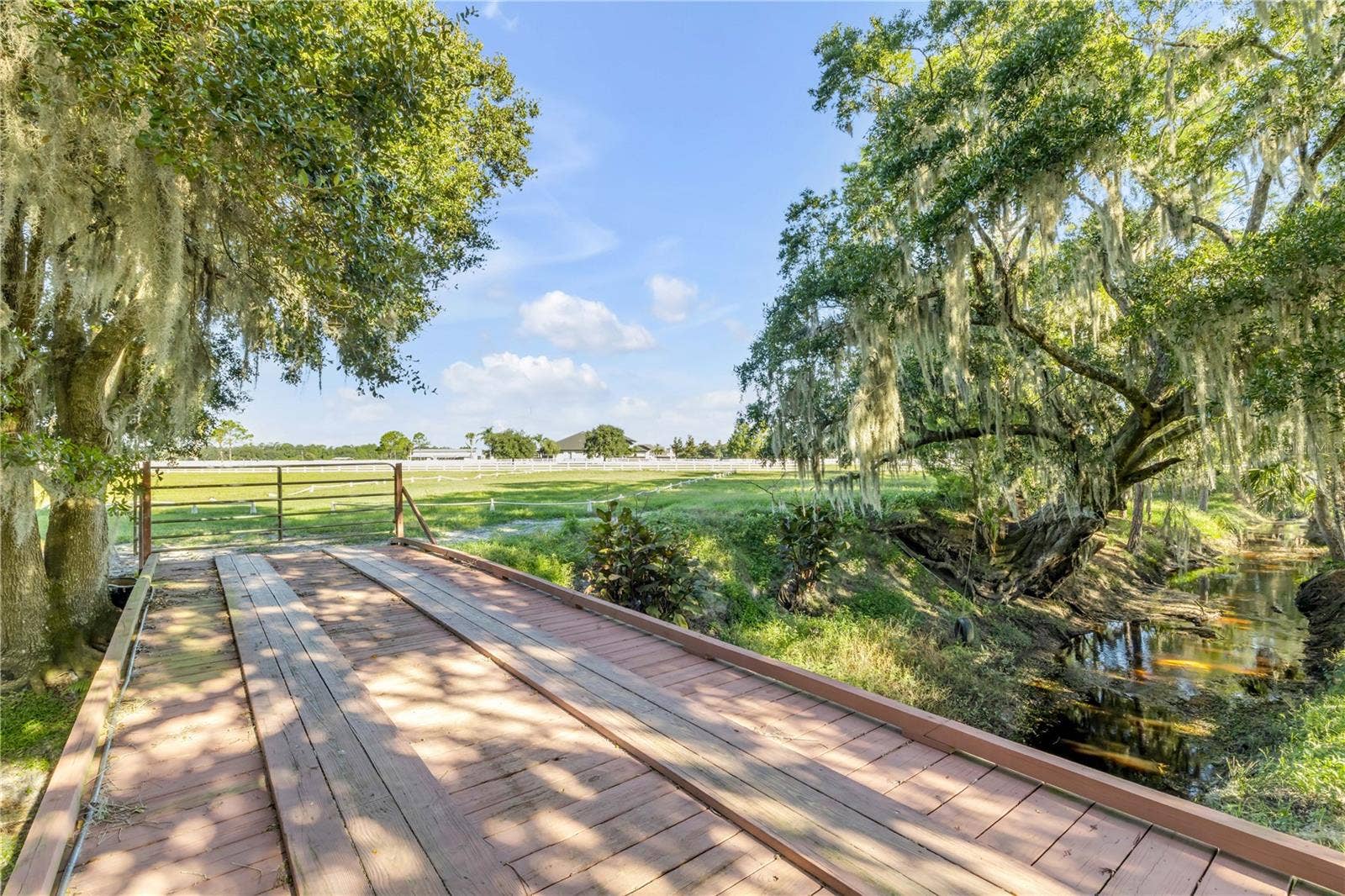 630 HAMMETT LANE, New Smyrna Beach, FL 32168 bridge over creek