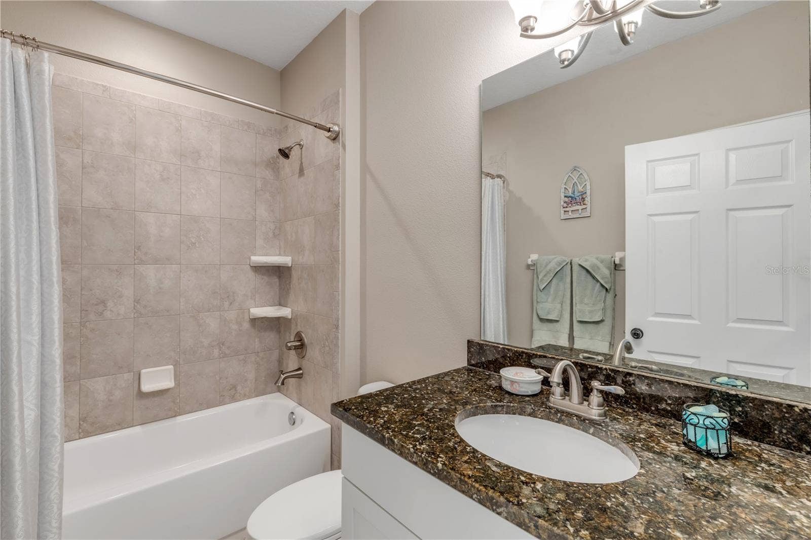 630 HAMMETT LANE, New Smyrna Beach, FL 32168 Guest bathroom