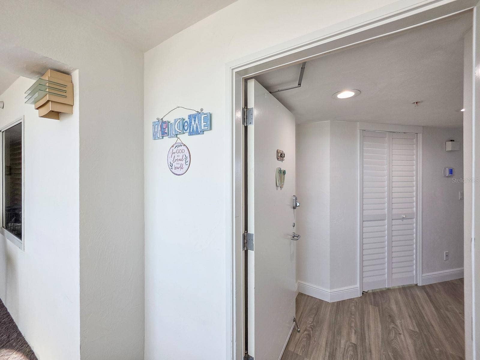 2545 S ATLANTIC AVENUE, #403, Daytona Beach Shores, FL 32118 Welcome home. Foyer view of hallway closet as you're entering paradise.