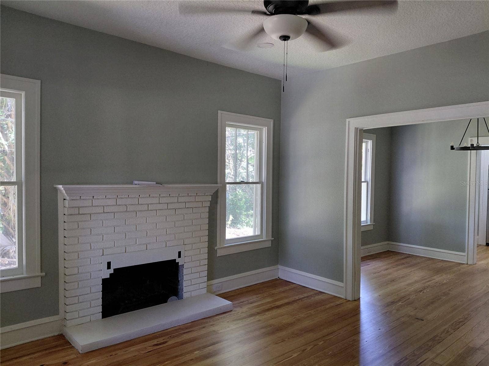 532 E RICH AVENUE, Deland, FL 32724 Living room 2 with view of dining room