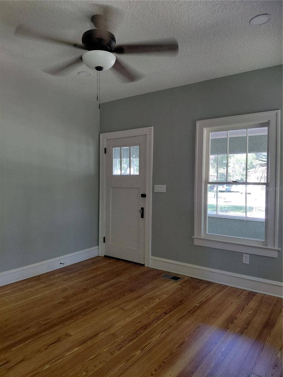 532 E RICH AVENUE, Deland, FL 32724 Front door living room