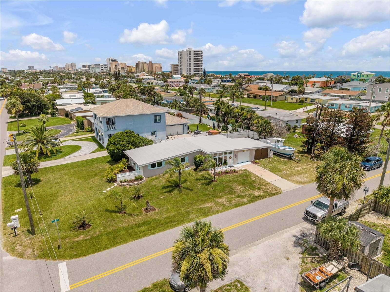 3929 S PENINSULA DRIVE, Port Orange, FL 32127 Elevated view of the home and its corner-lot setting.
