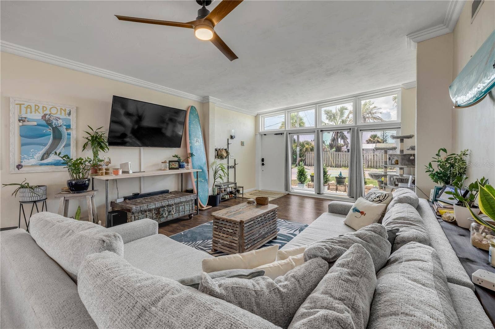 3929 S PENINSULA DRIVE, Port Orange, FL 32127 Living room with generous windows and natural light.
