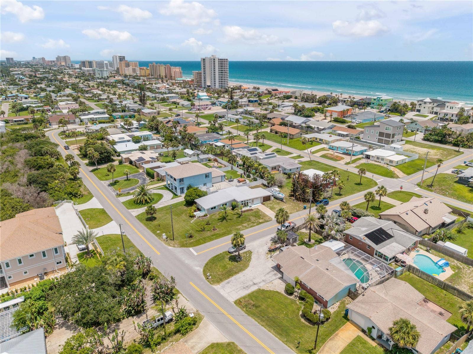 3929 S PENINSULA DRIVE, Port Orange, FL 32127 Neighborhood aerial showing the surrounding coastal community.