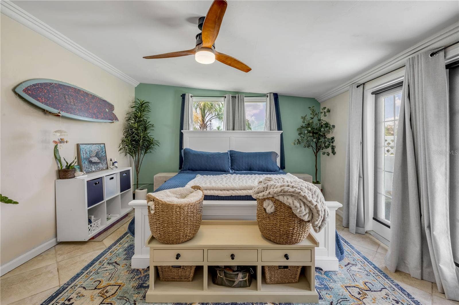 3929 S PENINSULA DRIVE, Port Orange, FL 32127 Bright sitting area with windows and a ceiling fan.