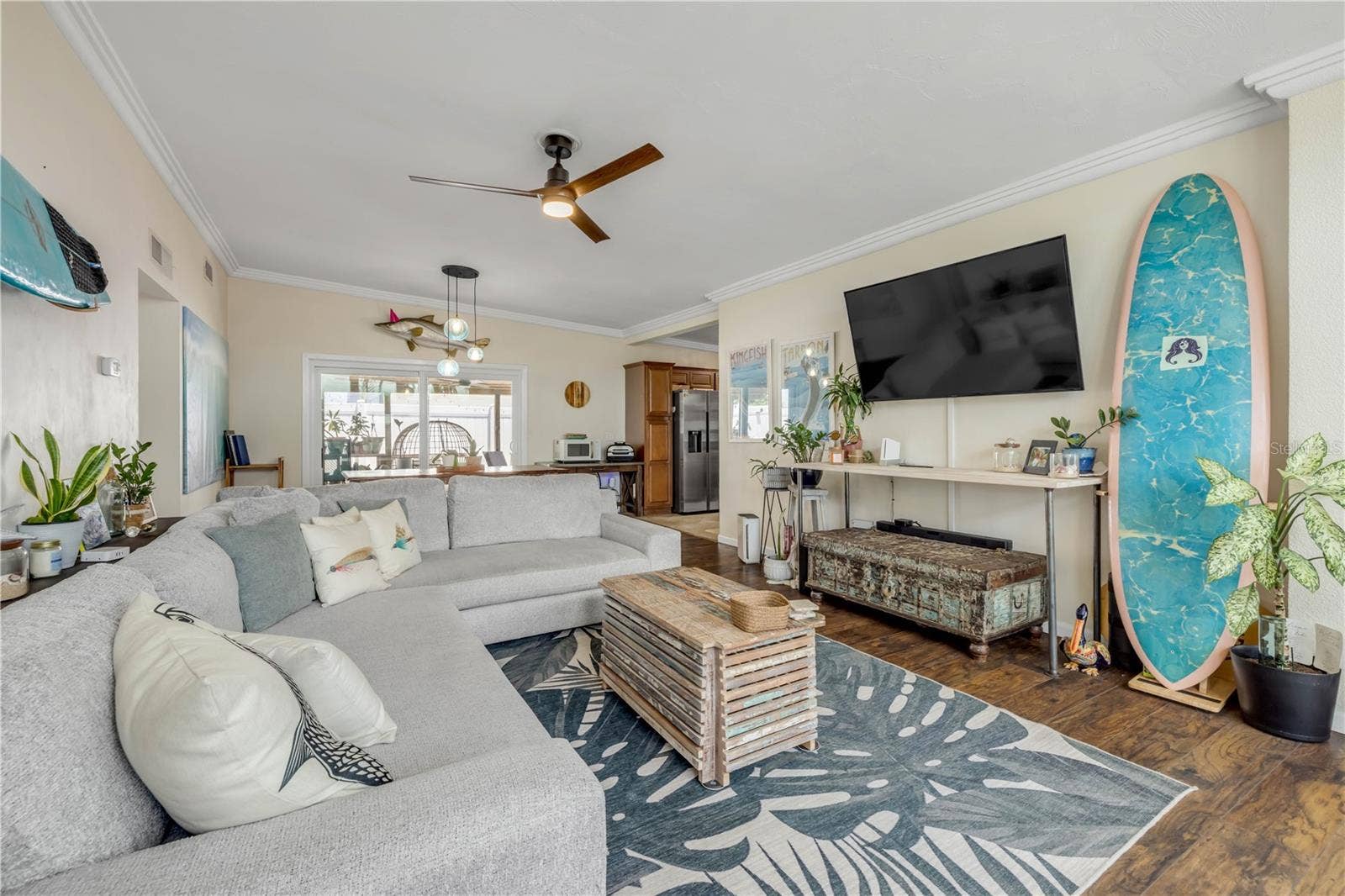3929 S PENINSULA DRIVE, Port Orange, FL 32127 Alternate living-room view showing the seating area and room layout.