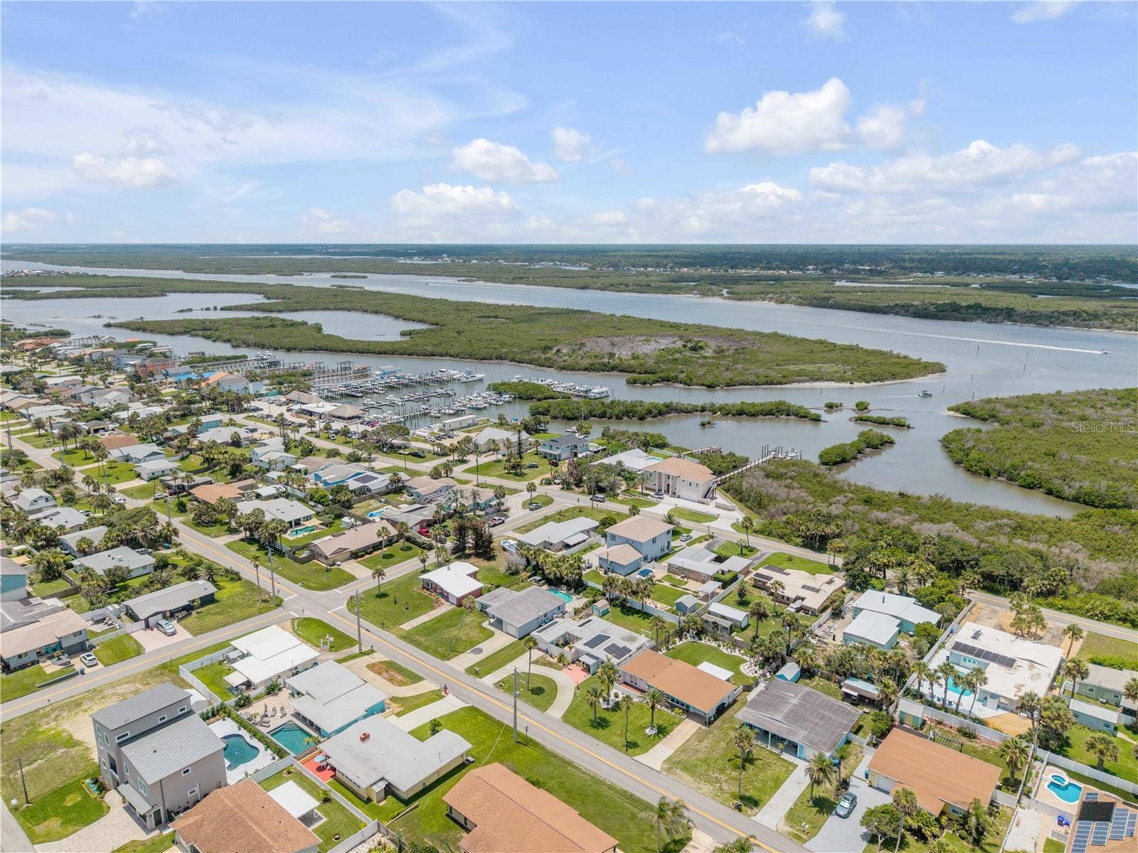 3929 S PENINSULA DRIVE, Port Orange, FL 32127 Wide aerial of the neighborhood and nearby waterways.