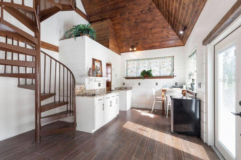 2627 JOHN ANDERSON DRIVE, Ormond Beach, FL 32176 circular staircase to upper bed and bath