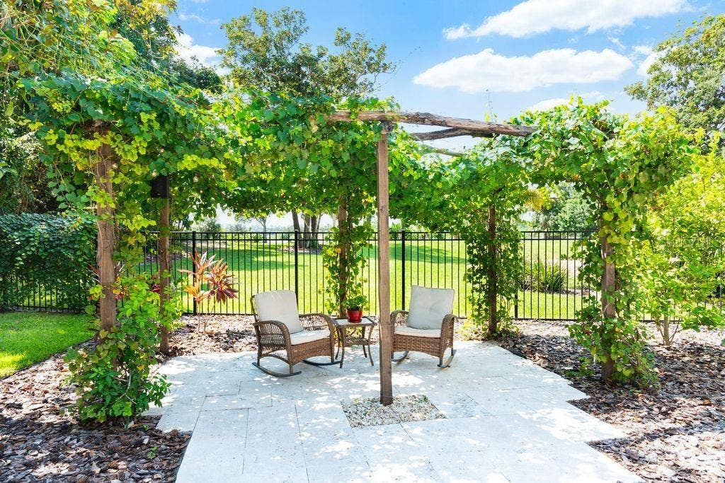 2627 JOHN ANDERSON DRIVE, Ormond Beach, FL 32176 Gazebo and landscape with river view
