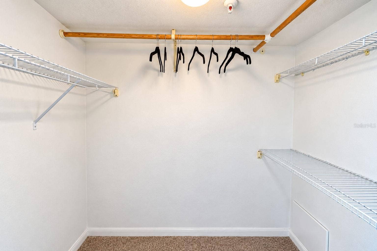 5207 S ATLANTIC AVENUE, #1126, New Smyrna Beach, FL 32169 Primary Bedroom Walk-in Closet.