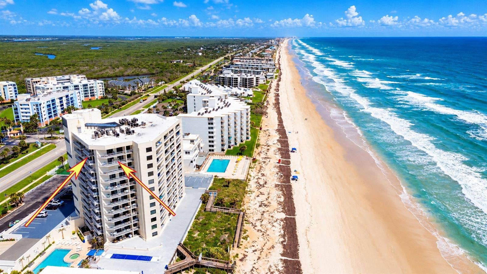 5207 S ATLANTIC AVENUE, #1126, New Smyrna Beach, FL 32169 11th Floor unit with three balconies and views from the beach to the river.