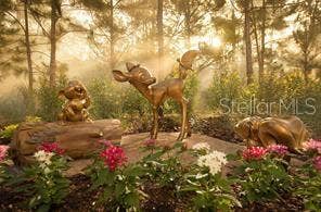 Disney friends in nature sculpture