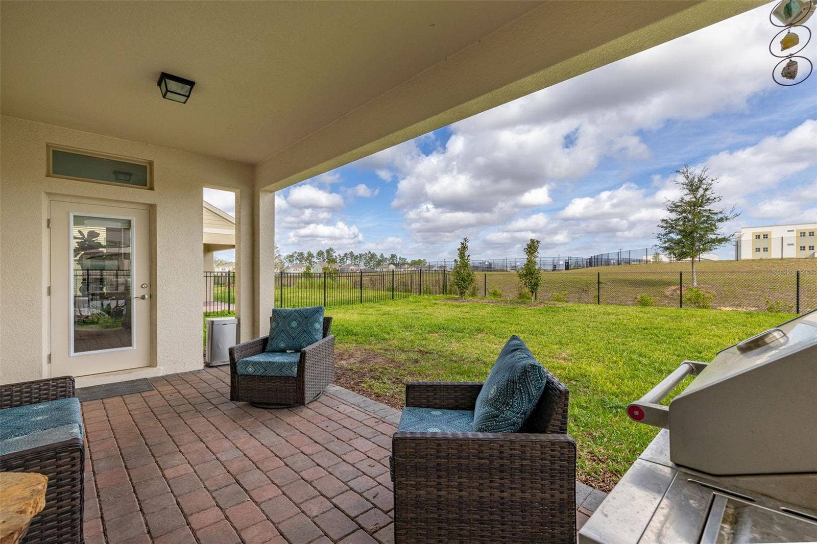18339 OLIVER TWIST WAY, Winter Garden, FL 34787 Covered Lanai with huge yard