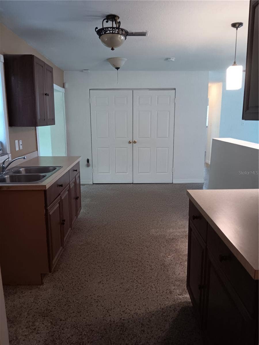 2103 MANTILLA AVENUE, Orlando, FL 32811 View from kitchen