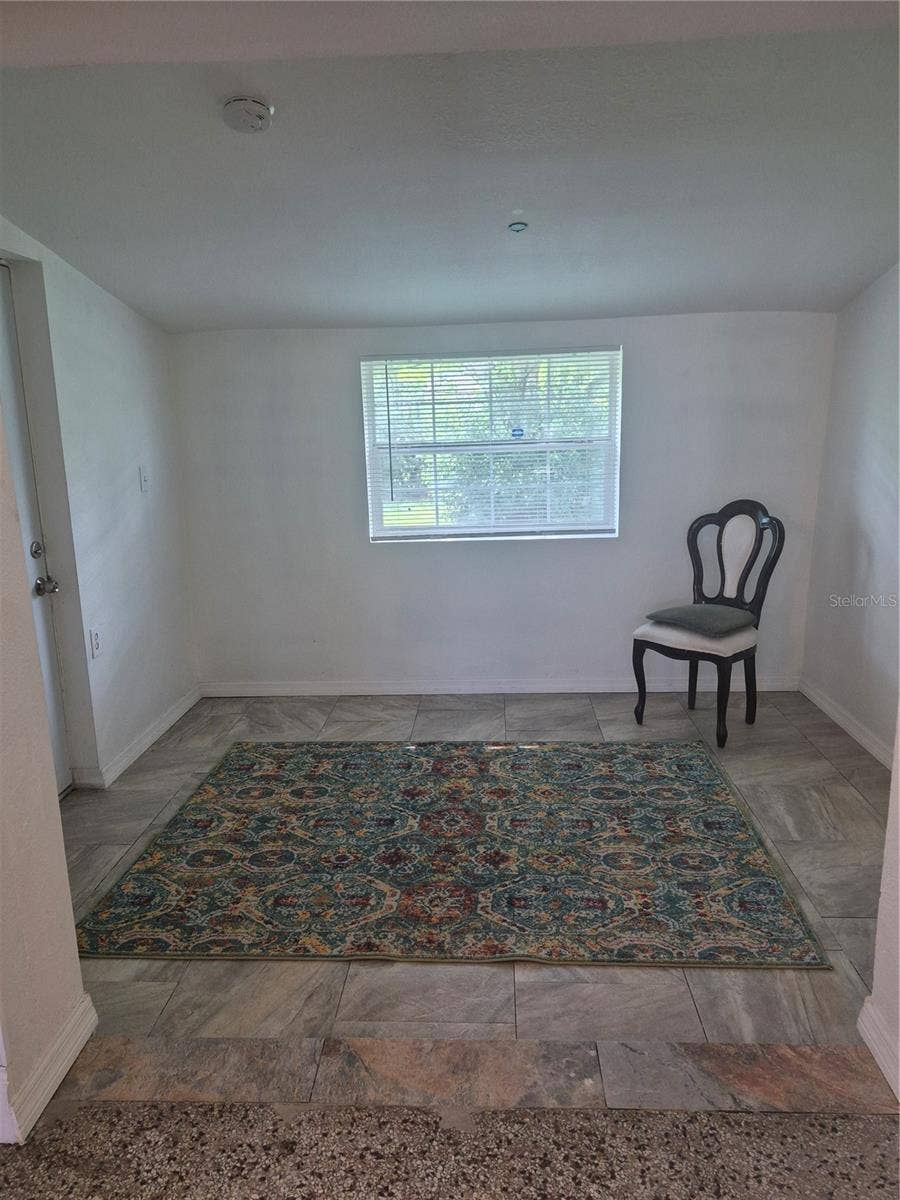 2103 MANTILLA AVENUE, Orlando, FL 32811 Actual bonus room with view of backyard