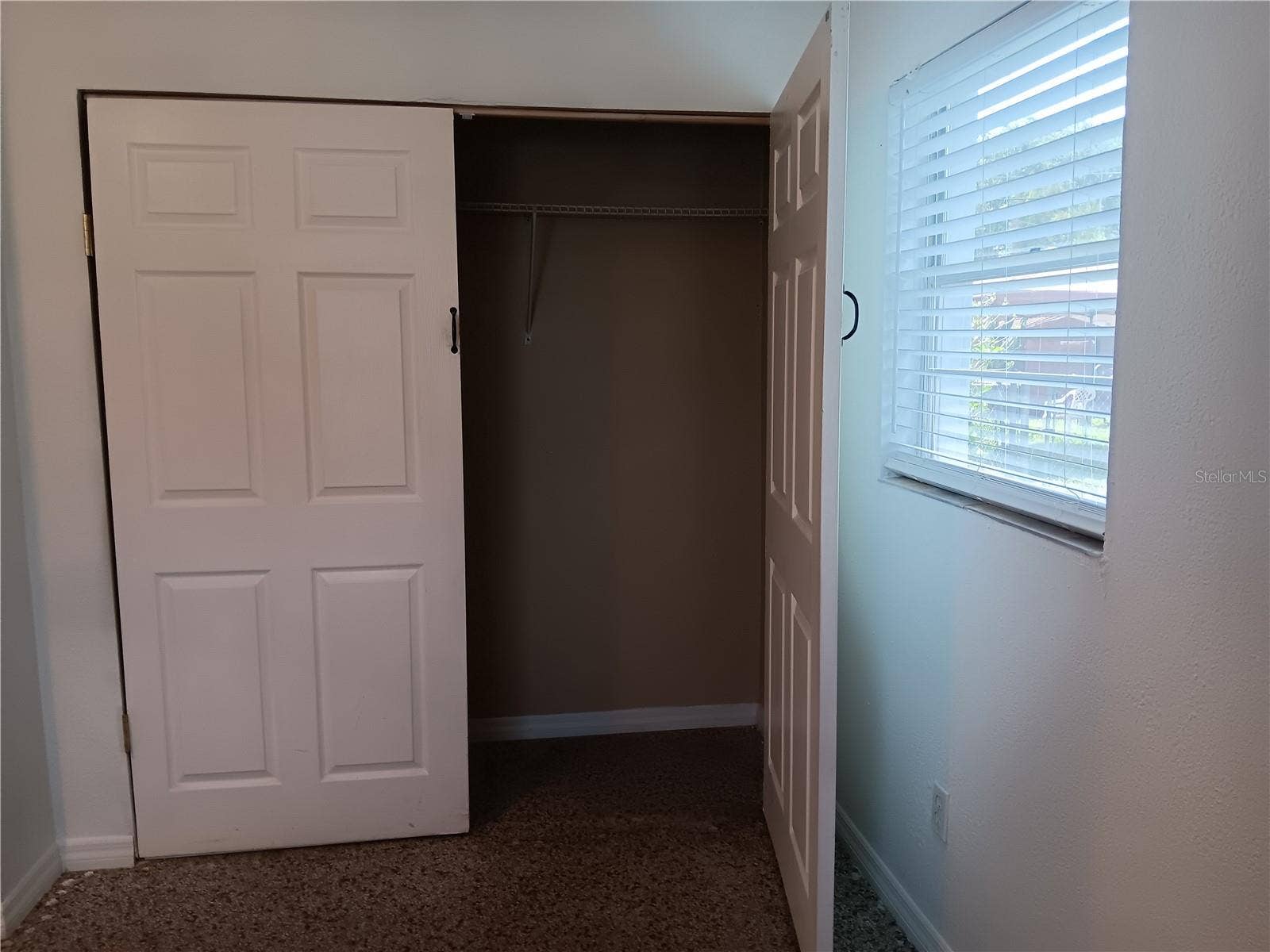 2103 MANTILLA AVENUE, Orlando, FL 32811 Primary bedroom closet