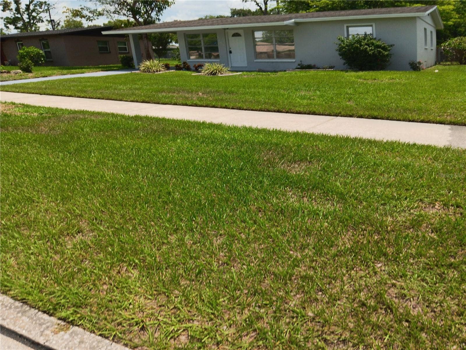 2103 MANTILLA AVENUE, Orlando, FL 32811 Exterior view from road