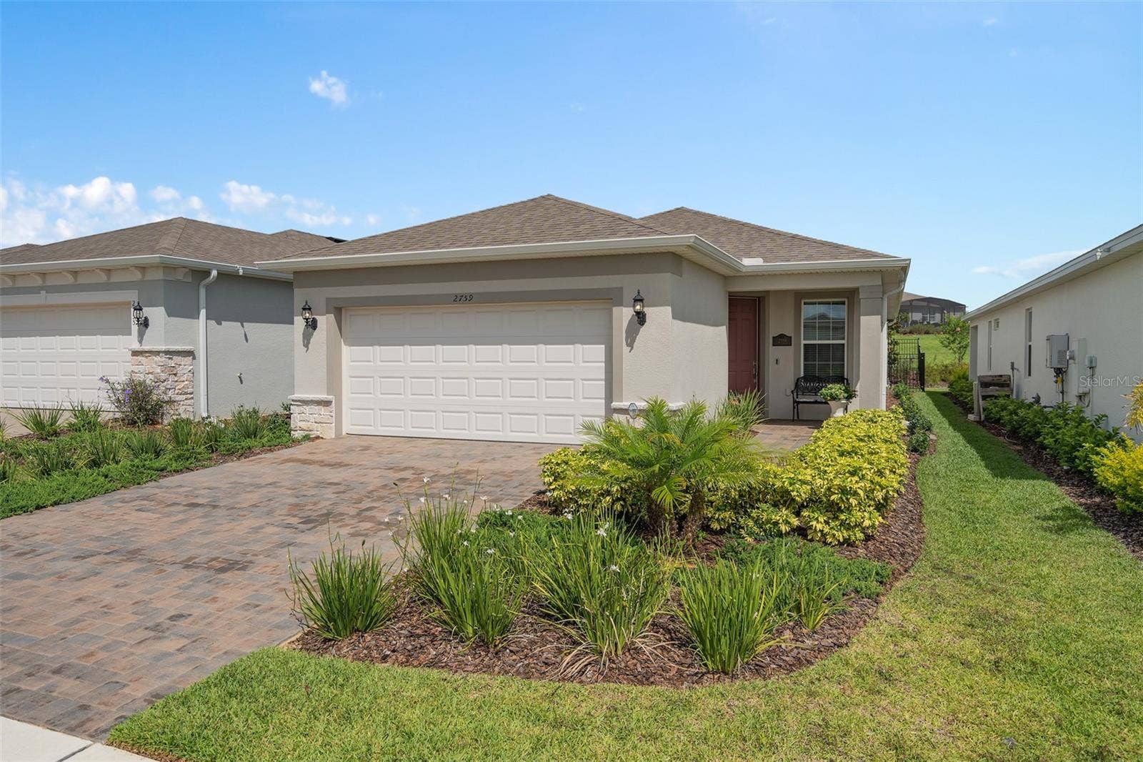 2759 PURPLE MEADOW COURT, Minneola, FL 34715 This home offers Great Curb Appeal with the upgraded Stone Accents and a Covered Front Porch