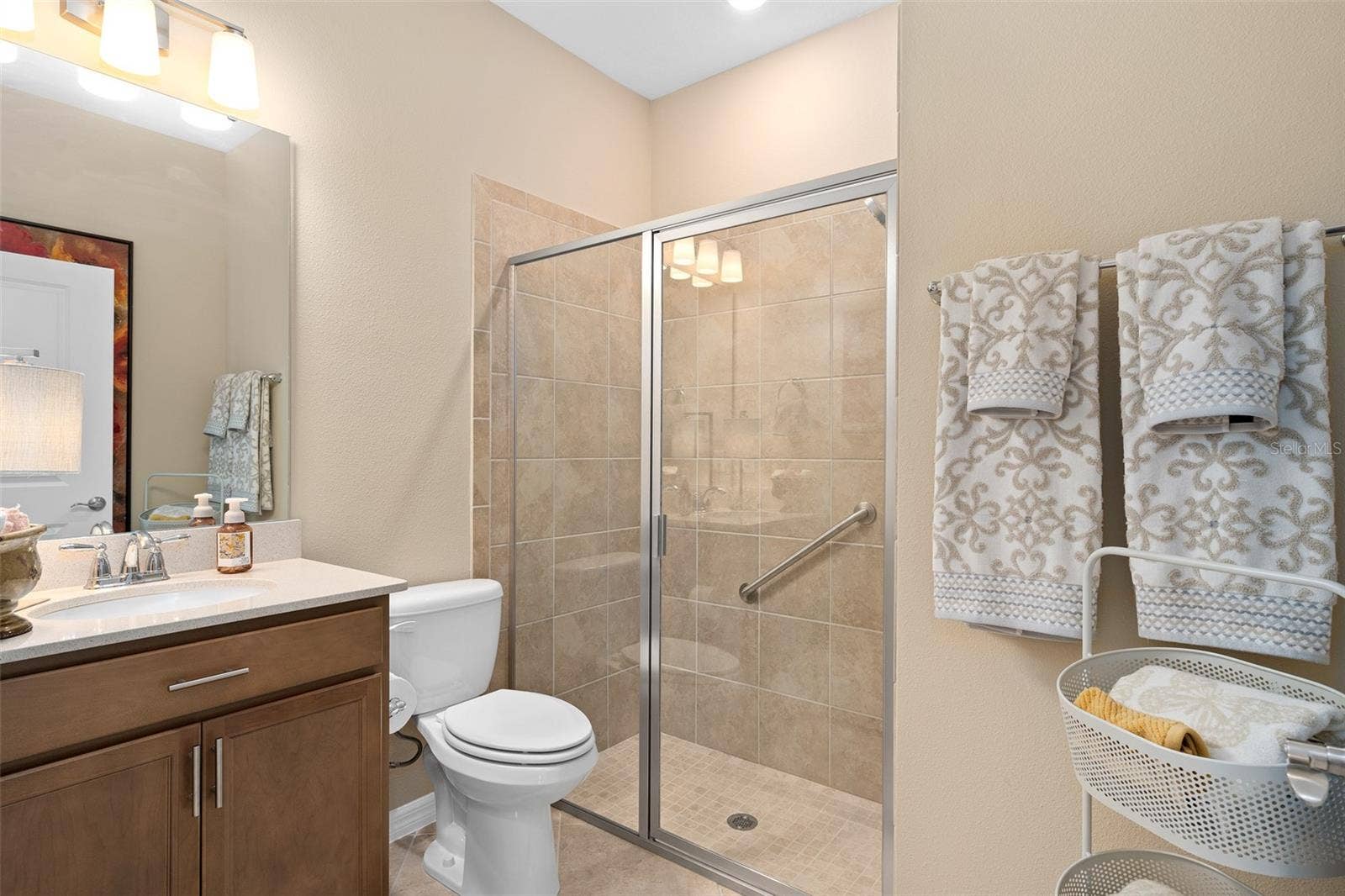 2759 PURPLE MEADOW COURT, Minneola, FL 34715 Bathroom 2 is Upgraded with a Shower and is adjacent to Bedroom 2 for the convenience of your guests