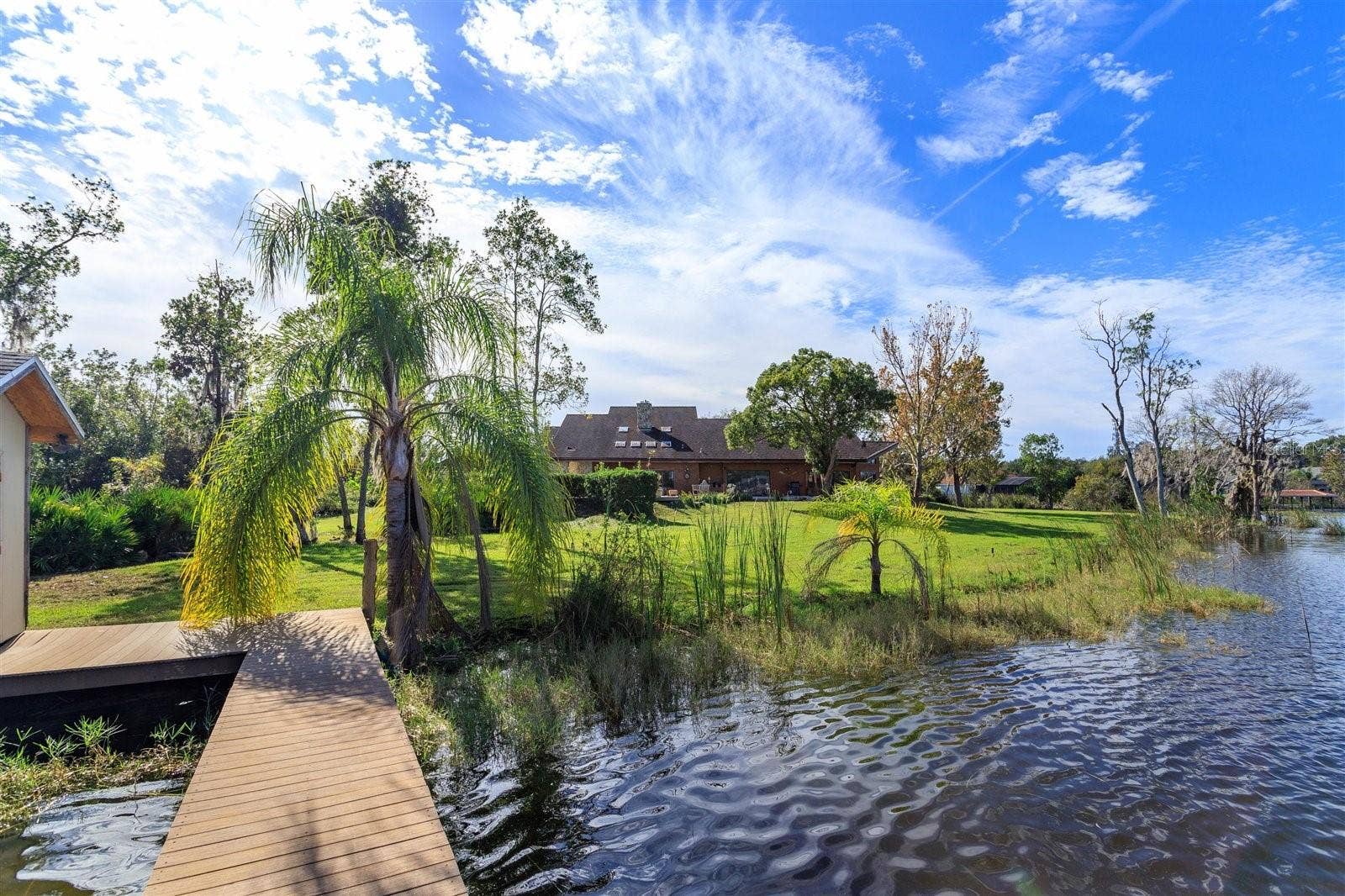 13377 LAKE BUTLER BOULEVARD, Winter Garden, FL 34787 view of rear from existing dock