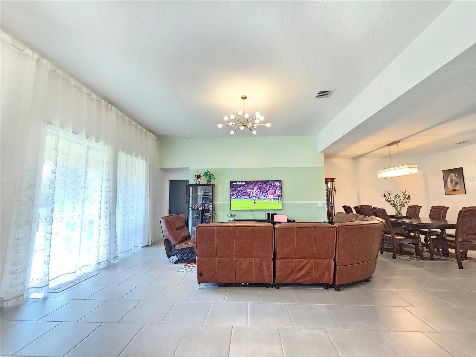 1351 OLYMPIC CLUB BOULEVARD, Champions Gate, FL 33896 Living Room and Dining Room