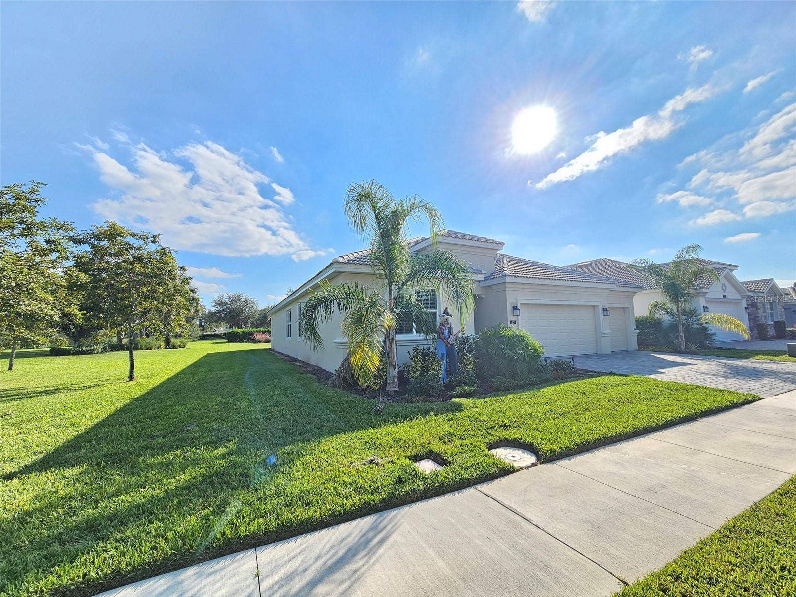 1351 OLYMPIC CLUB BOULEVARD, Champions Gate, FL 33896 Left side of the house