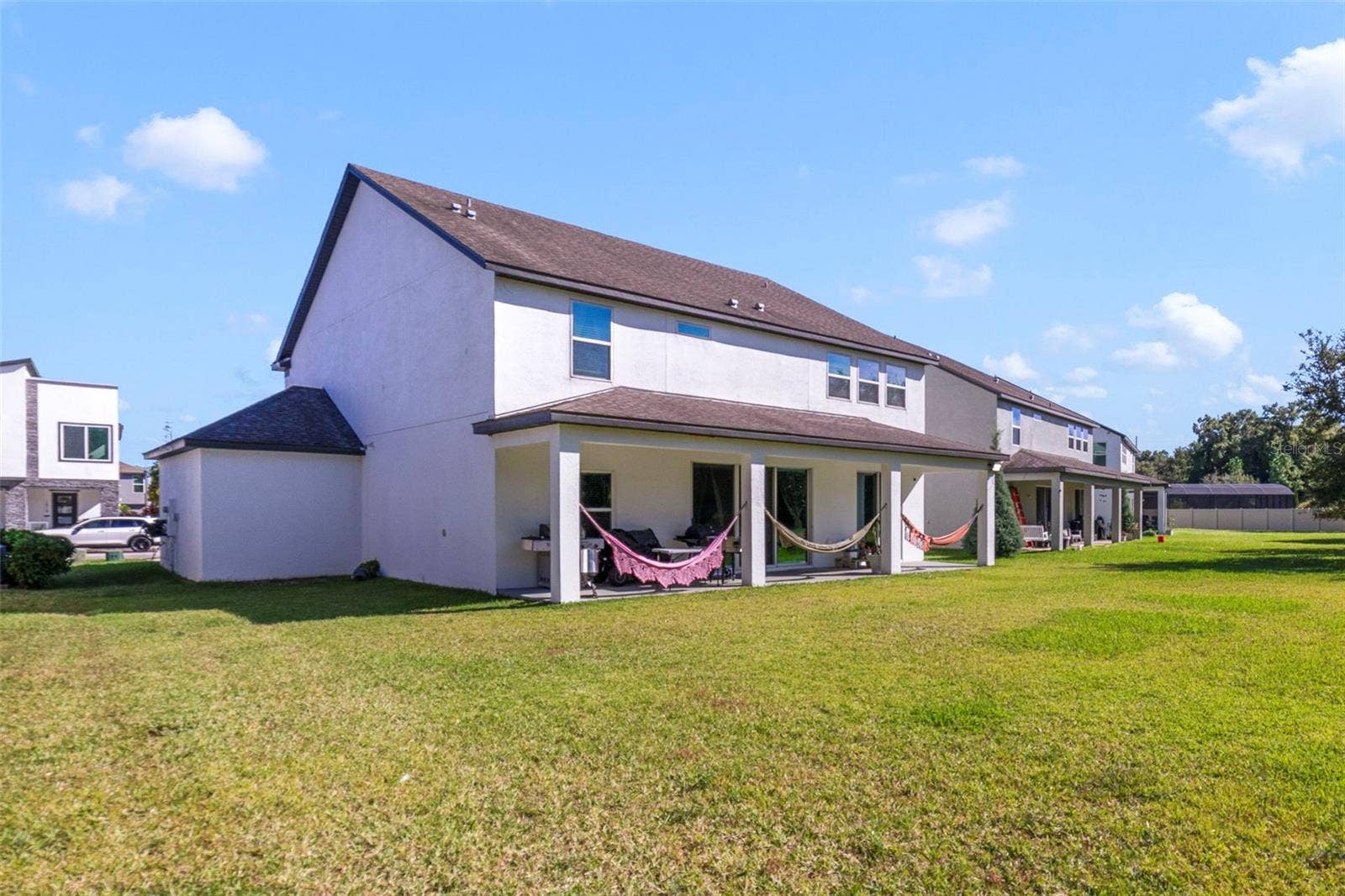 Outside, enjoy a large covered patio and an EXPANSIVE BACKYARD, ideal for future customization, gatherings, or play.