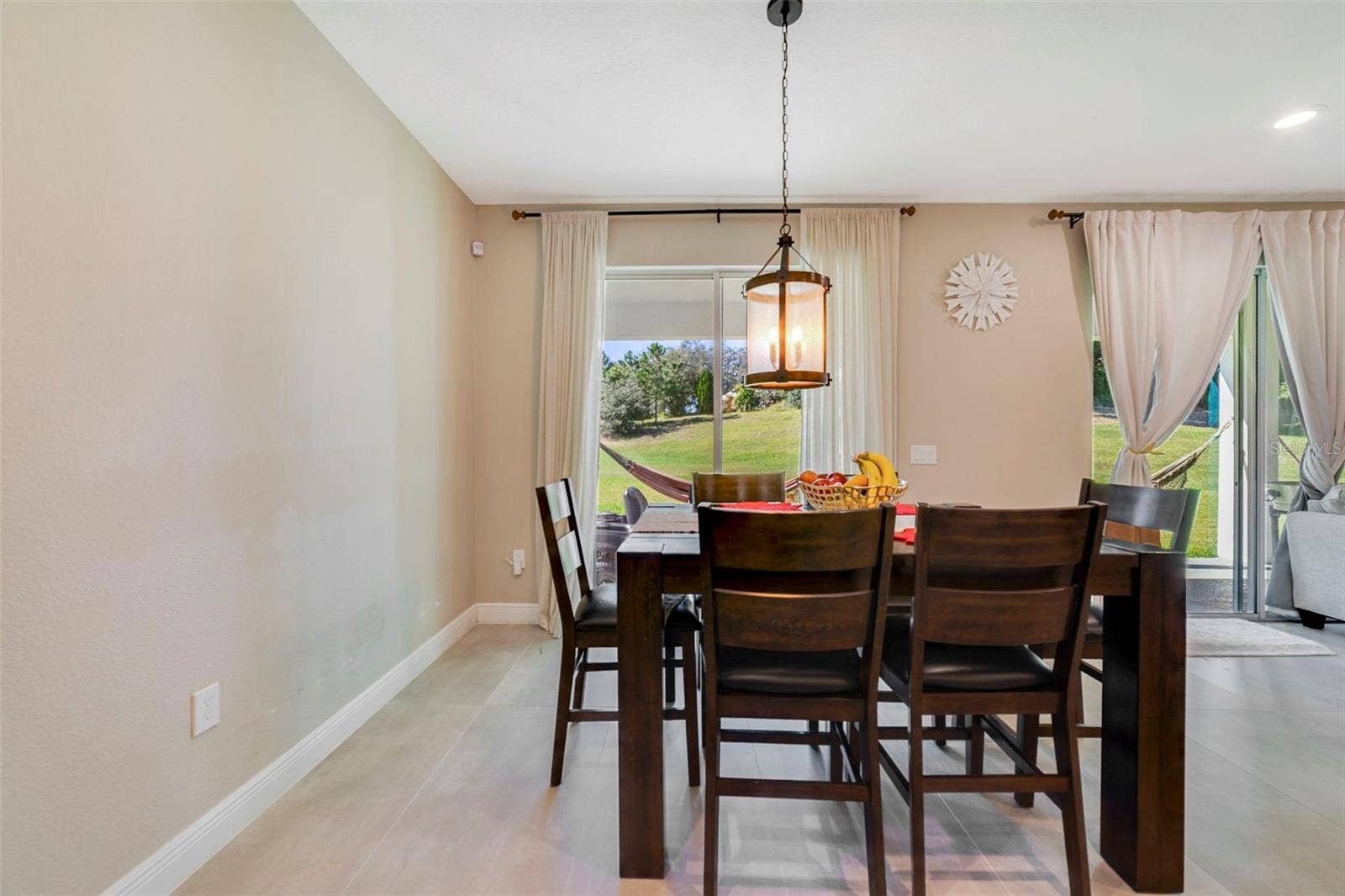 A spacious Dinette area overlooks the backyard, adding a warm and functional touch to the heart of the home.