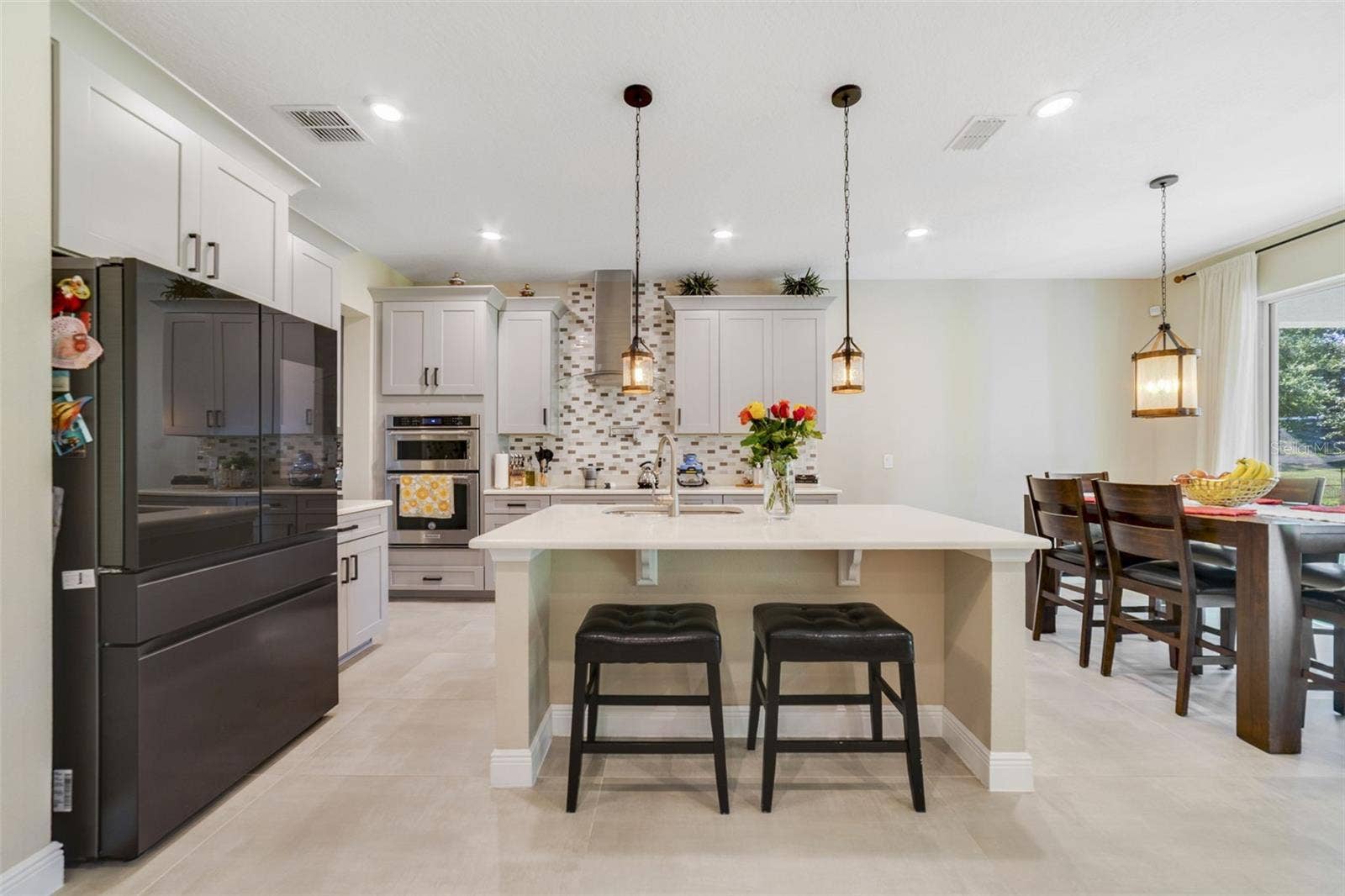 A generous center island brings extra prep space and room for counter-height seating.