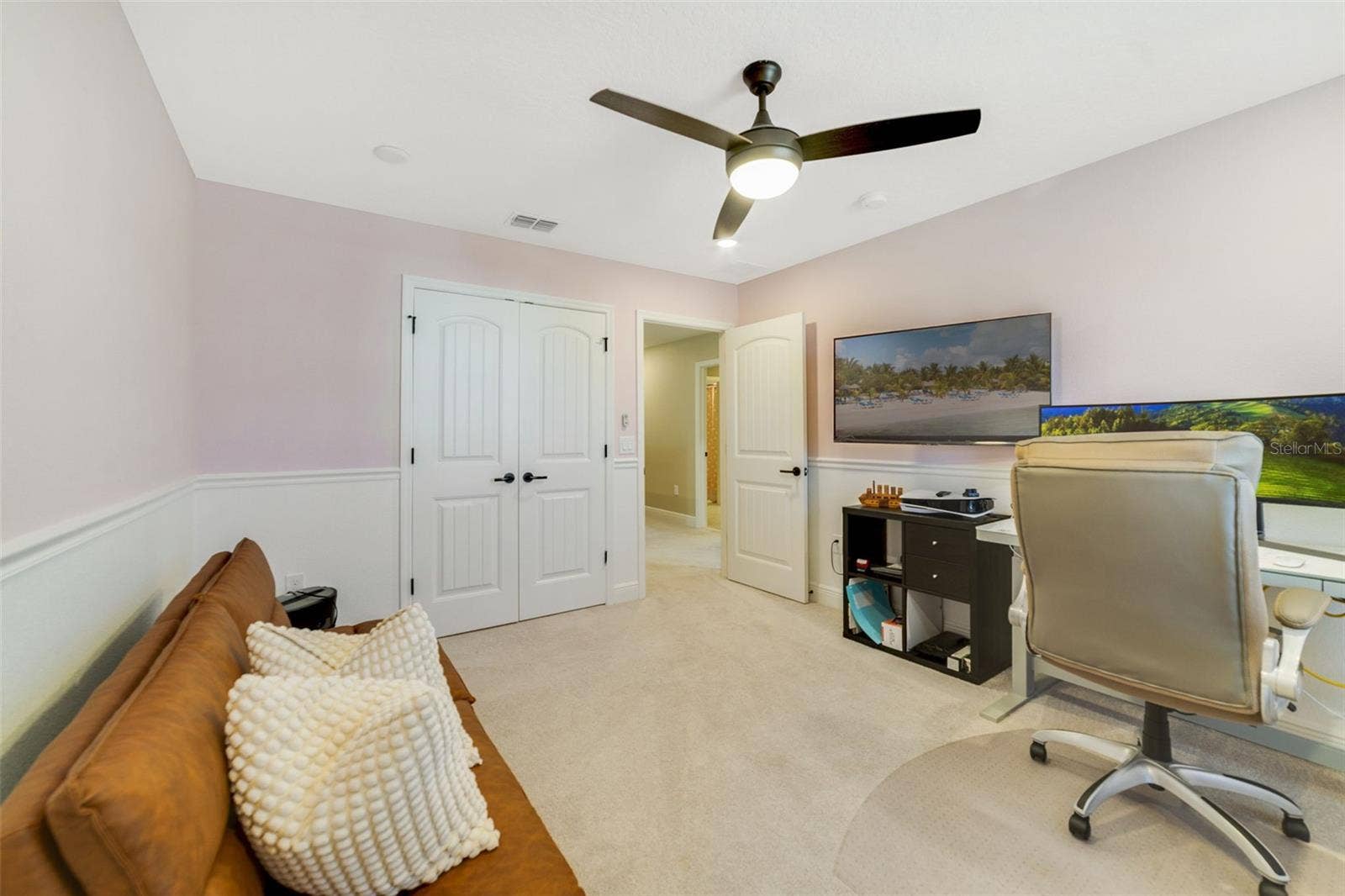 Three additional bedrooms and another full bath offer plenty of comfortable space for family and guests.  Bedroom 2.