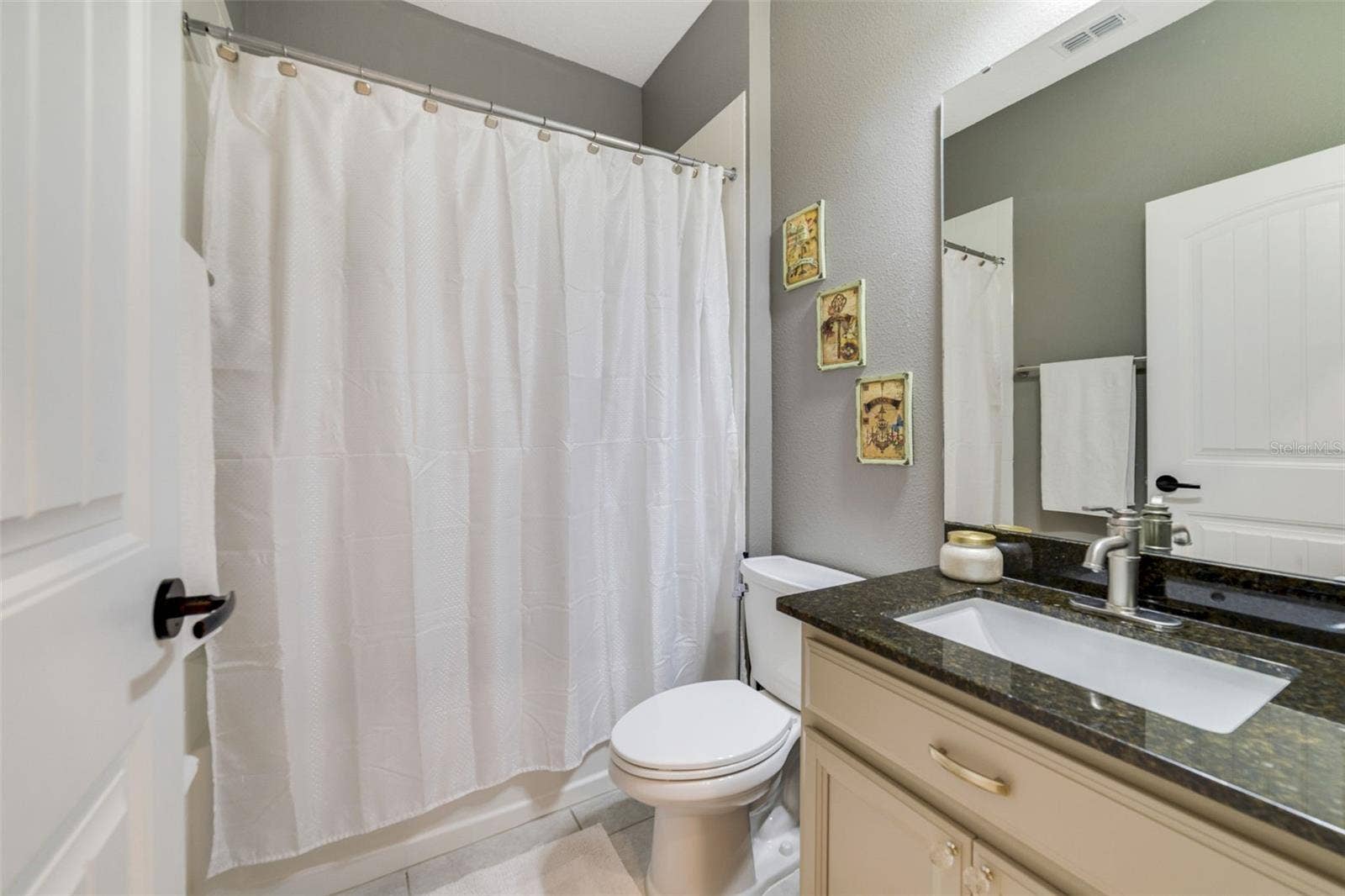 A functional first-floor full Bath offers everything you need for daily convenience and guest use.