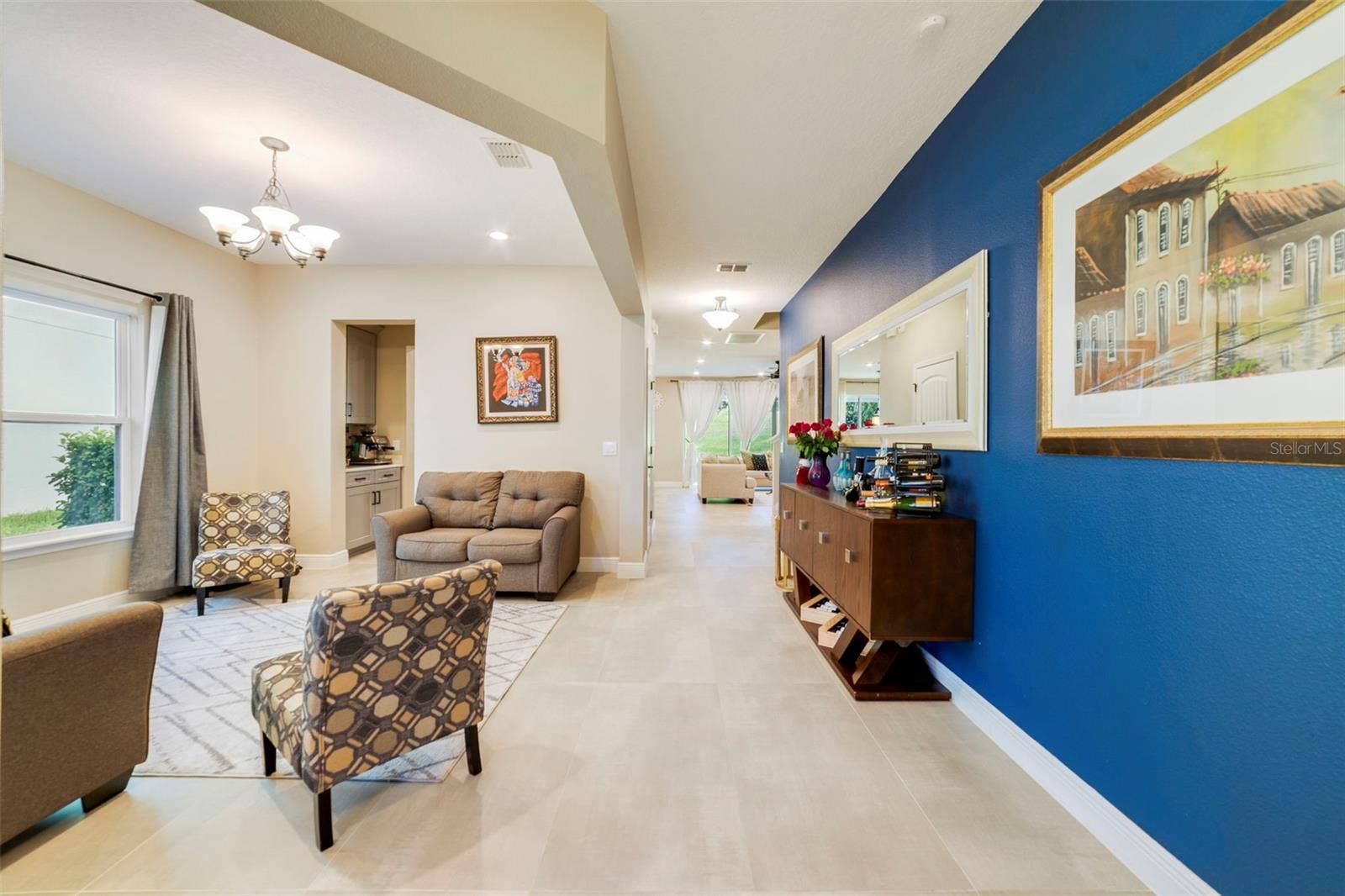 A separate Dining room offers flexibility for family gatherings or can easily serve as a formal Living room.