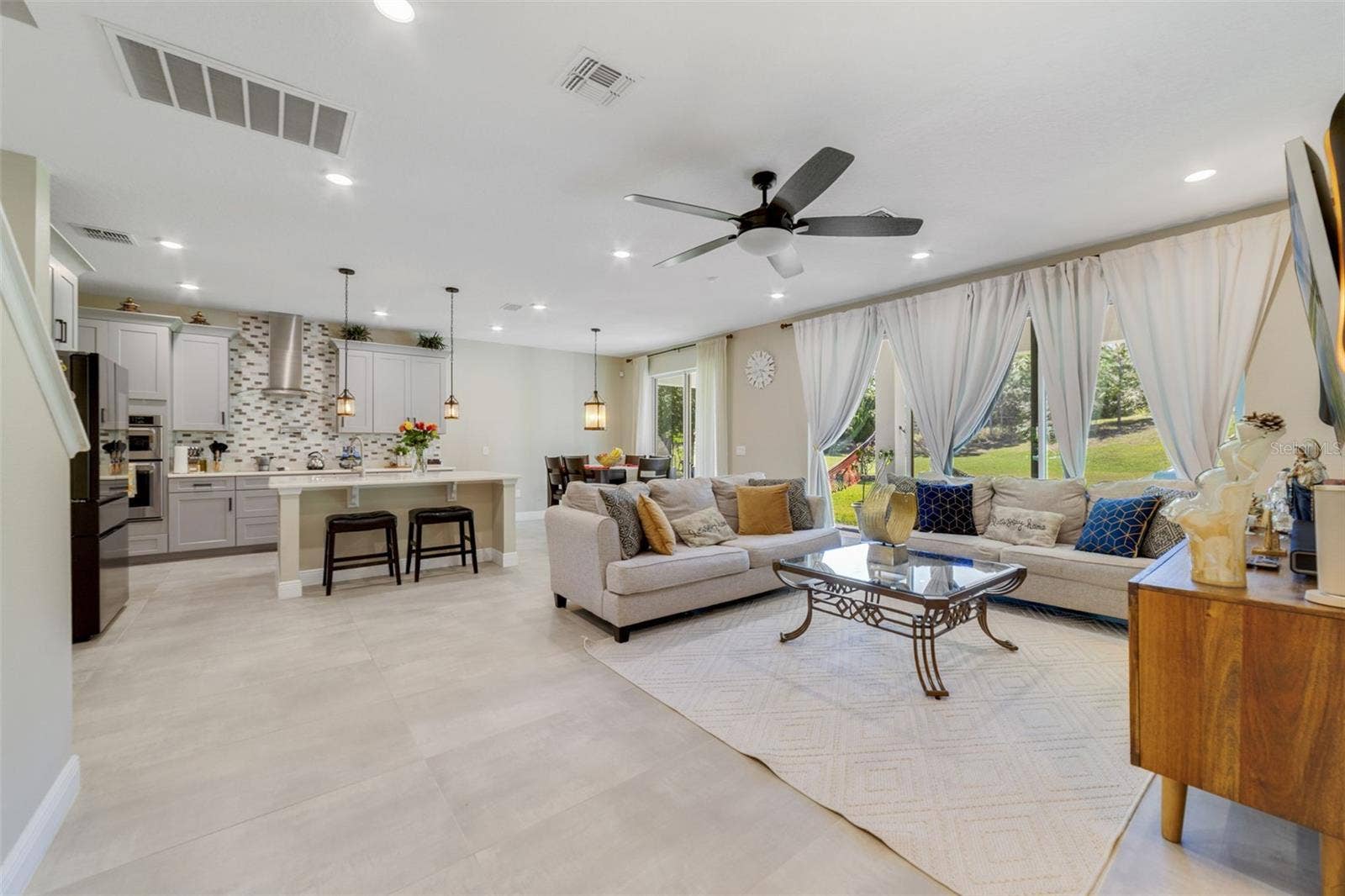 Step inside to an inviting OPEN-CONCEPT LAYOUT, where the chefs Kitchen overlooks the spacious Living area.