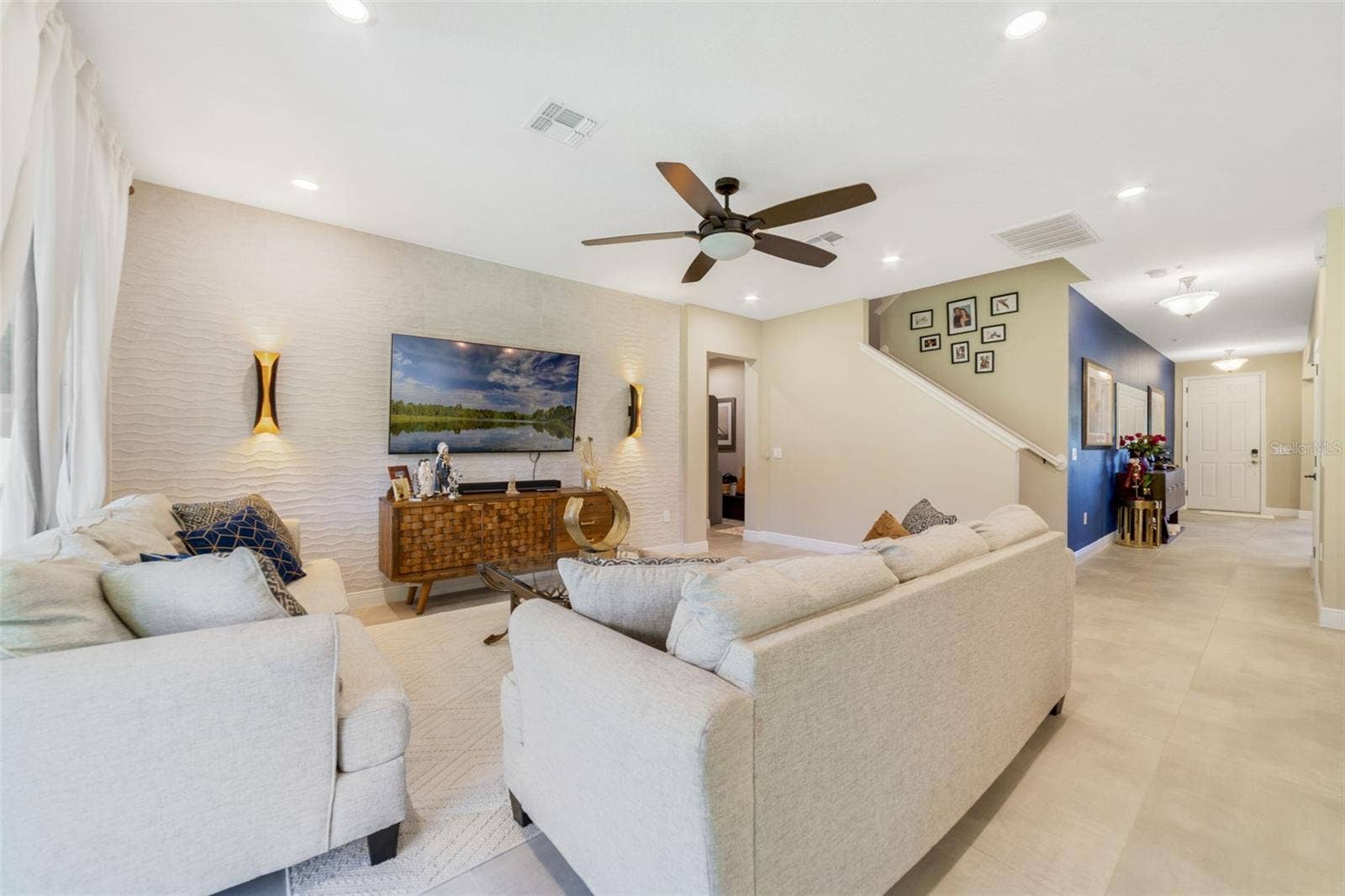 Conveniently adjacent to the Kitchen, the expansive Living area invites connection and comfort.